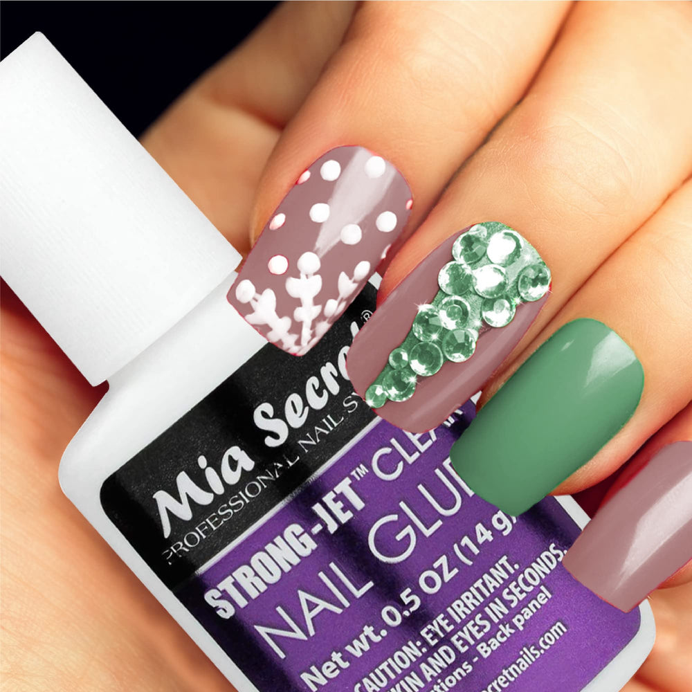 Mia Secret Strong-Jet dried nail with crystal embellishments secured with strong hold.