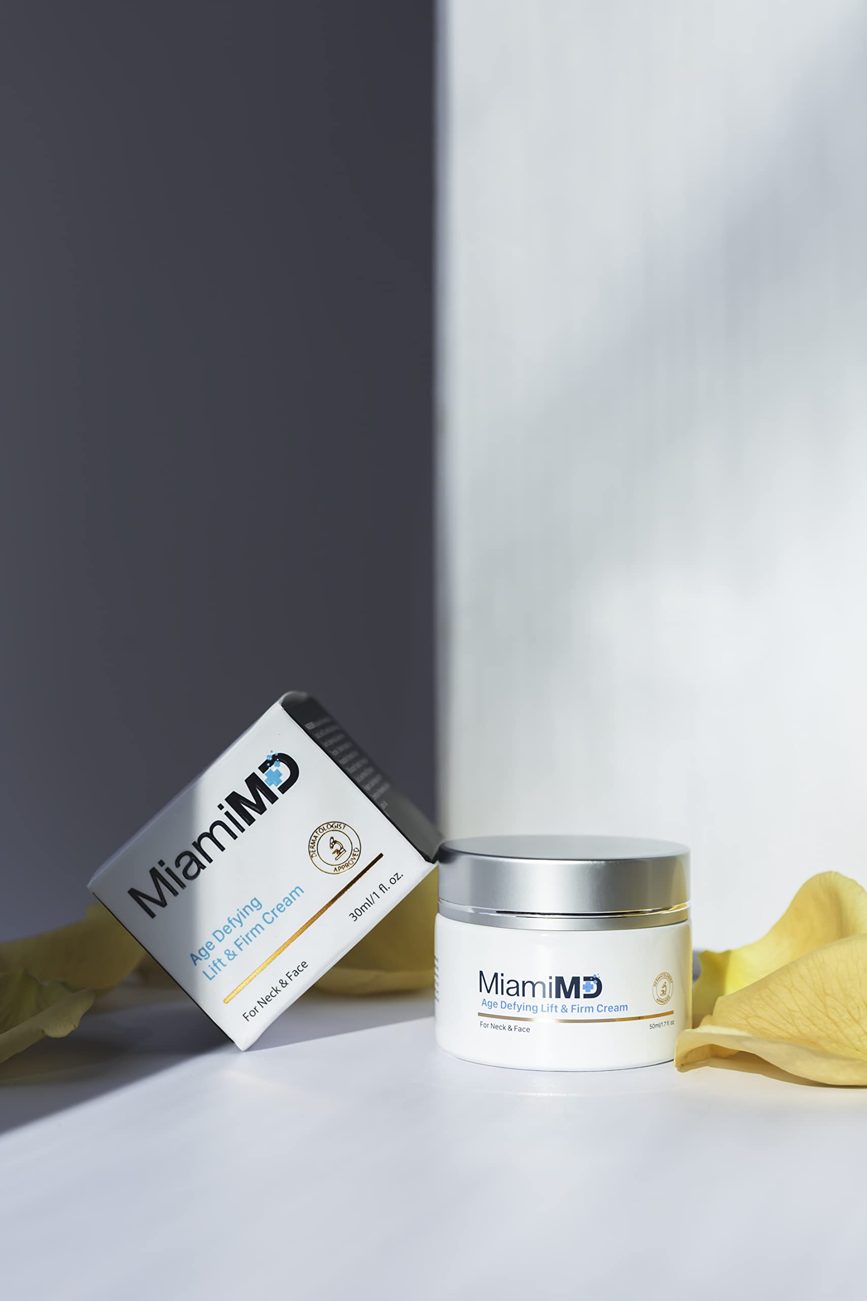MiamiMD Lift & Firm Cream on jawline for smoother contour.