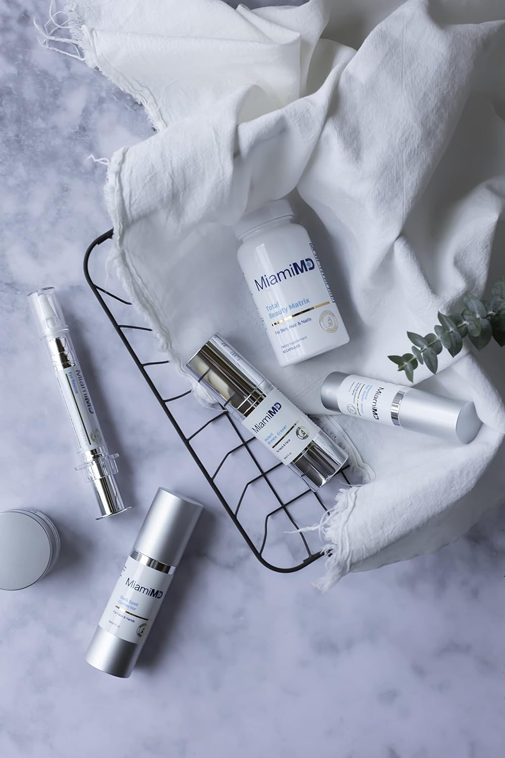 Swirl texture suggests quick absorption with MiamiMD serum.