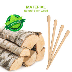Mibly wooden wax sticks near eyebrow area for precise shaping.