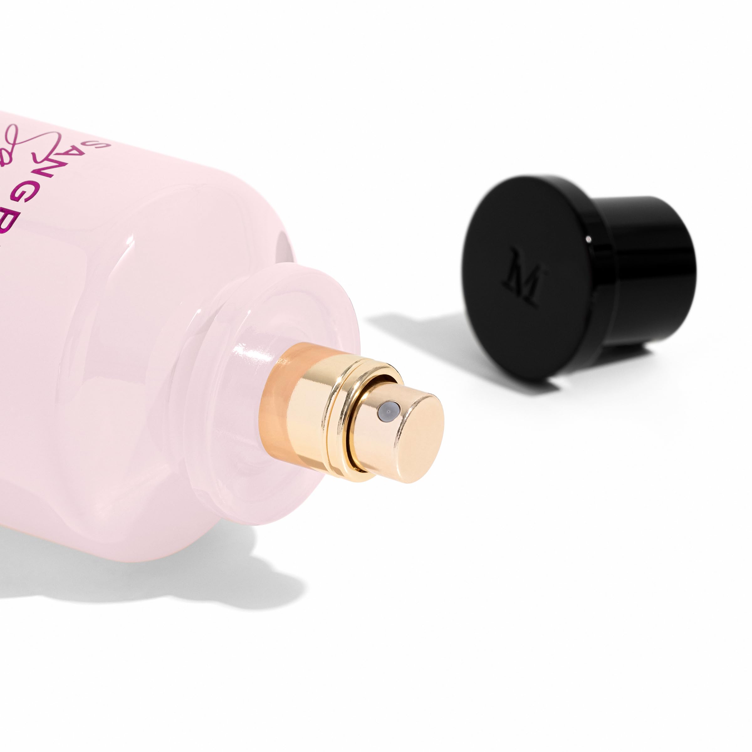 Michael Malul Sangria + Saffron EDP bottle cap, a refined finishing touch.