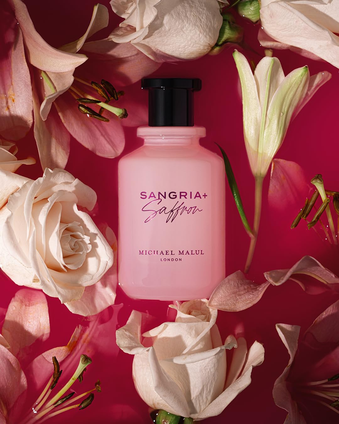 Michael Malul Sangria + Saffron EDP lifestyle shot suggests confident, stylish urban wear.