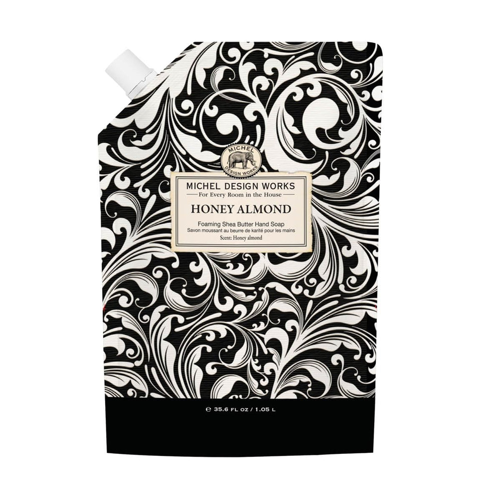 Michel Design Works jabón de manos espumoso con aroma a almendra y miel en botella.