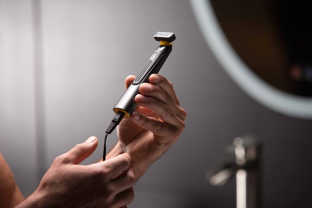 MicroTouch SOLO Titanium USB charging cable enabling convenient cordless grooming