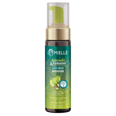 Botella de Mielle Avocado & Tamanu Mousse para definición suave de rizos.