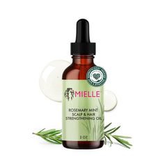 Mielle Organics Aceite Romero y Menta en botella para cabello hidratado.