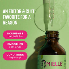 Masaje del cuero cabelludo con aceite de romero y menta de Mielle Organics.