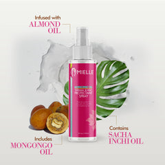 Mielle Organics Mongongo Oil Curl Pattern Protection demonstrates curl support when styling with heat