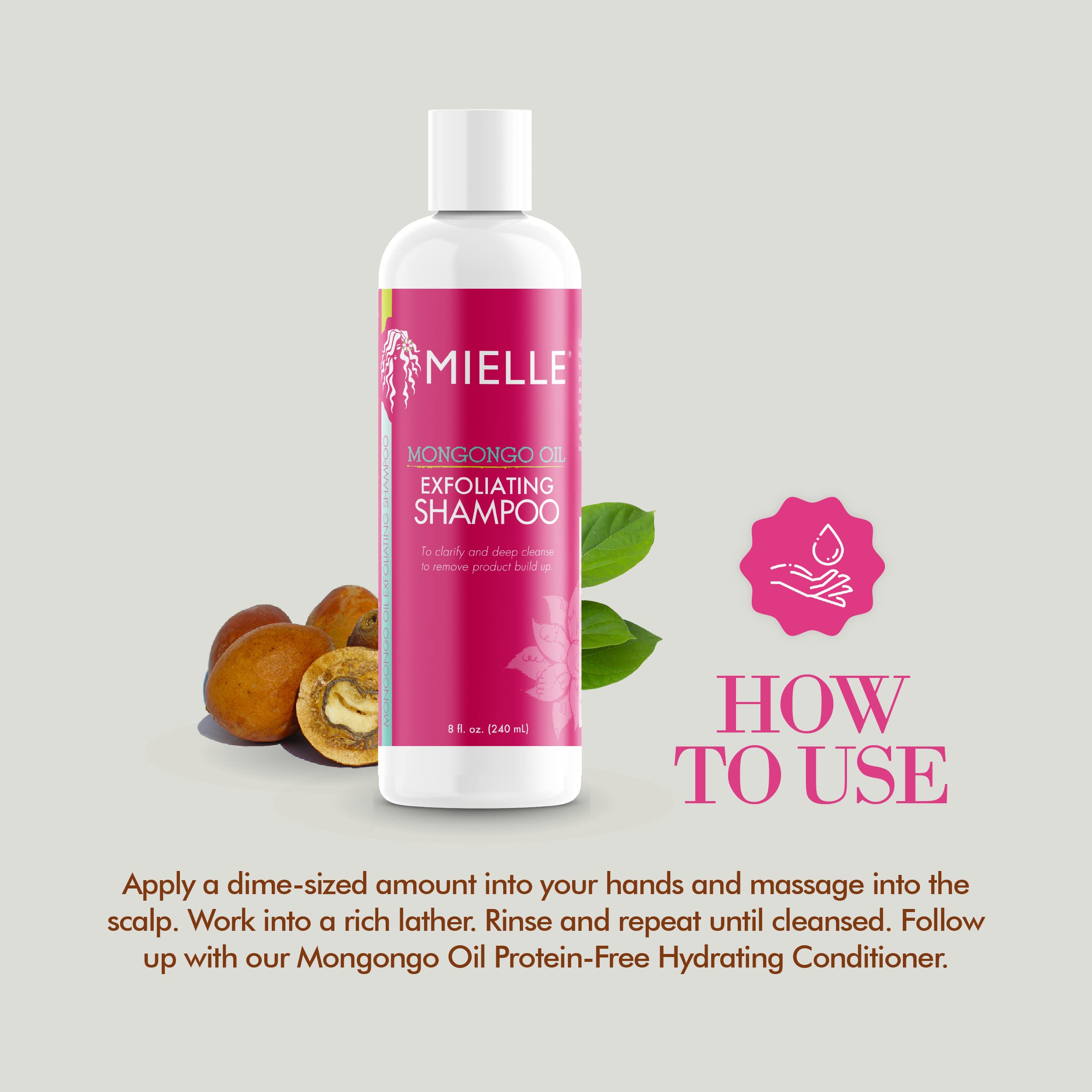 Applying Mongongo Shampoo on damp hair to remove buildup and refresh the scalp.