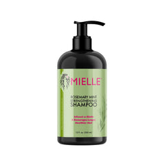 Acondicionador Rosemary Mint de Mielle en botella, desenreda y nutre para brillo suave.