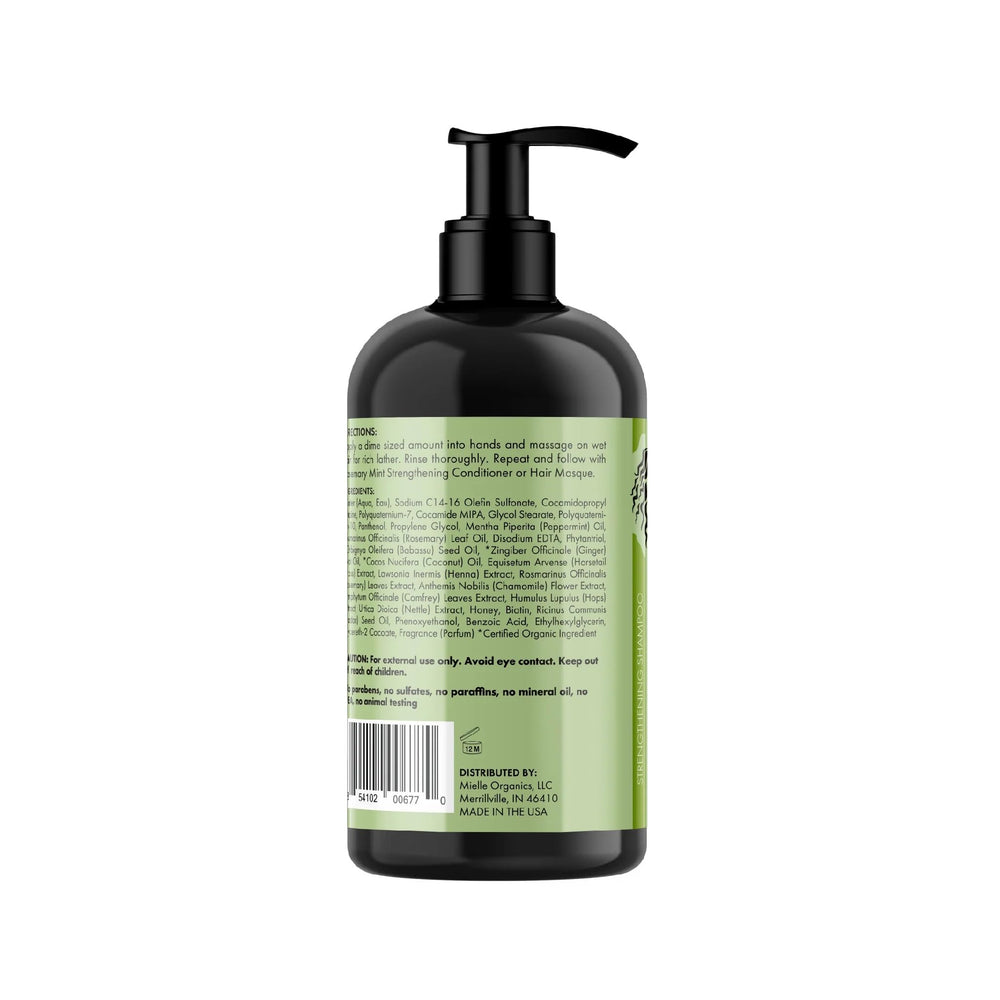 Etiqueta del shampoo Rosemary Mint de Mielle, destacando biotina para fortalecimiento capilar.
