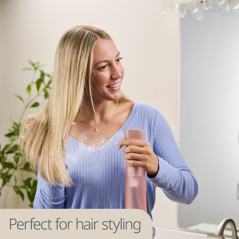 MIGHTY STRONG water spray bottle for hair care and hydration.