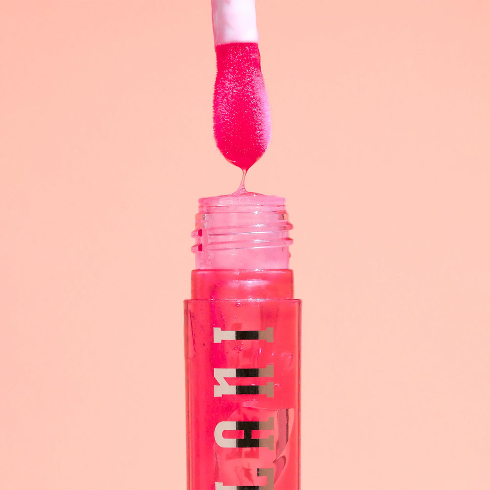 Envase ergonómico de Milani Lip Oil para manejo cómodo.