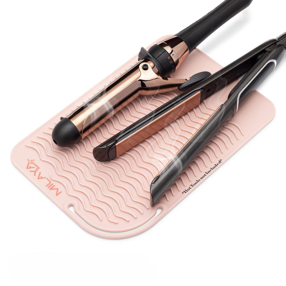 Milaya Beauty large heat mat under a flat iron protecting countertops.