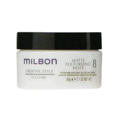 Milbon Matte Texturizing Paste tube for versatile matte hold and reworkable styling.