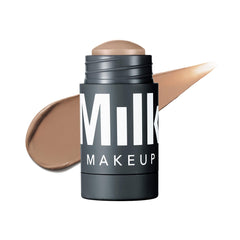 Milk Makeup Sculpt Stick applying cool-tone contour to cheekbones for natural shadows