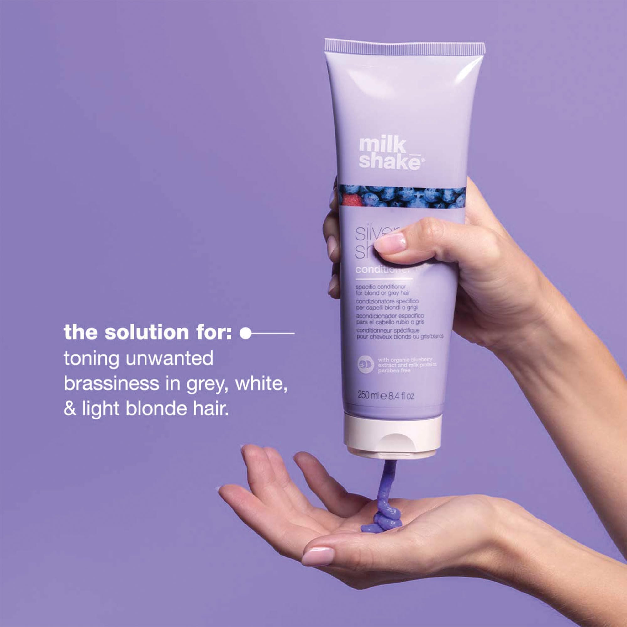 milk-shake Silver Shine conditioner being applied to blonde hair