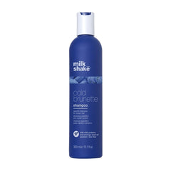 milk_shake Cold Brunette Shampoo bottle pouring blue pigments to neutralize warm brunette tones