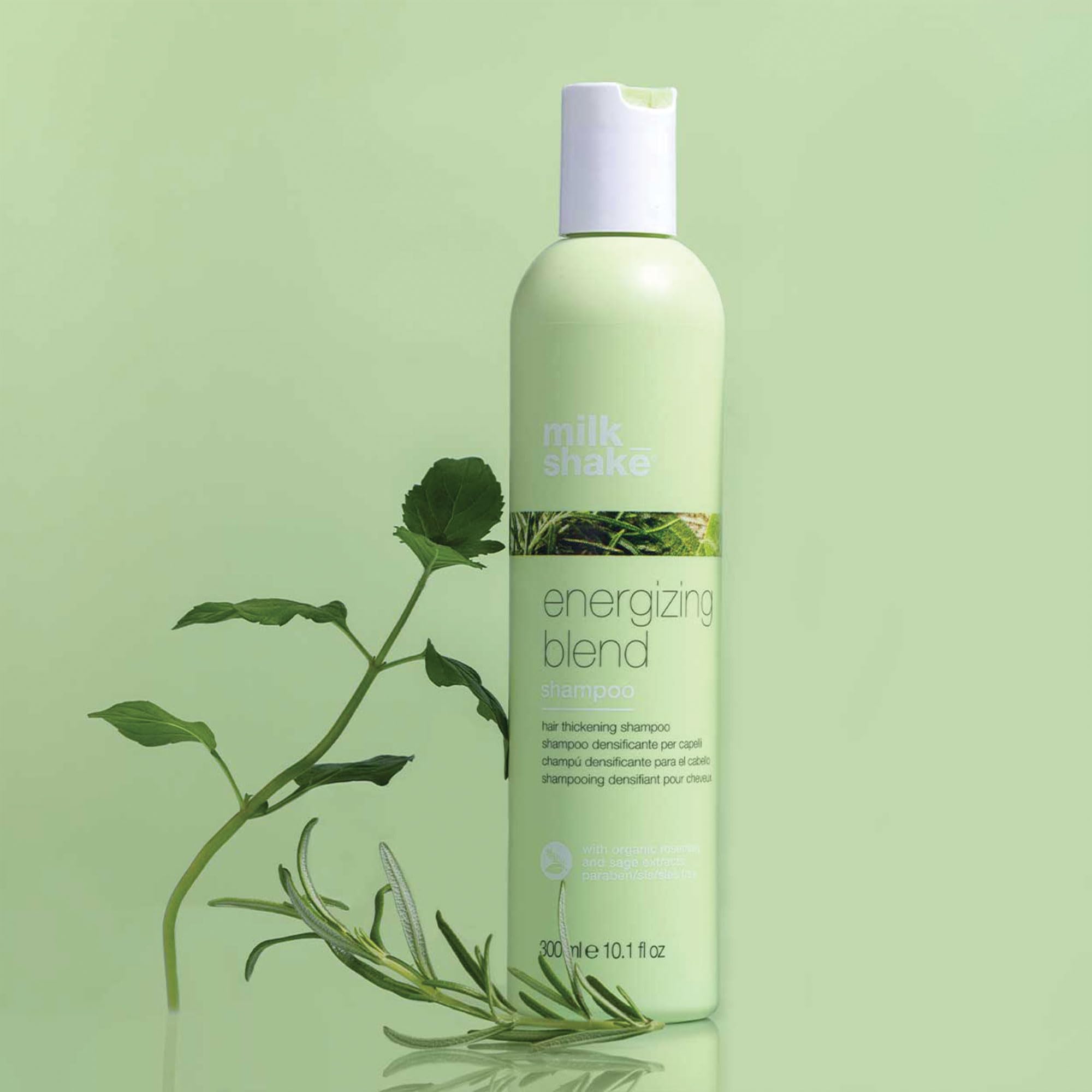 Milk_Shake Energizing Blend Shampoo bottle with hair strand showing improved density potential.