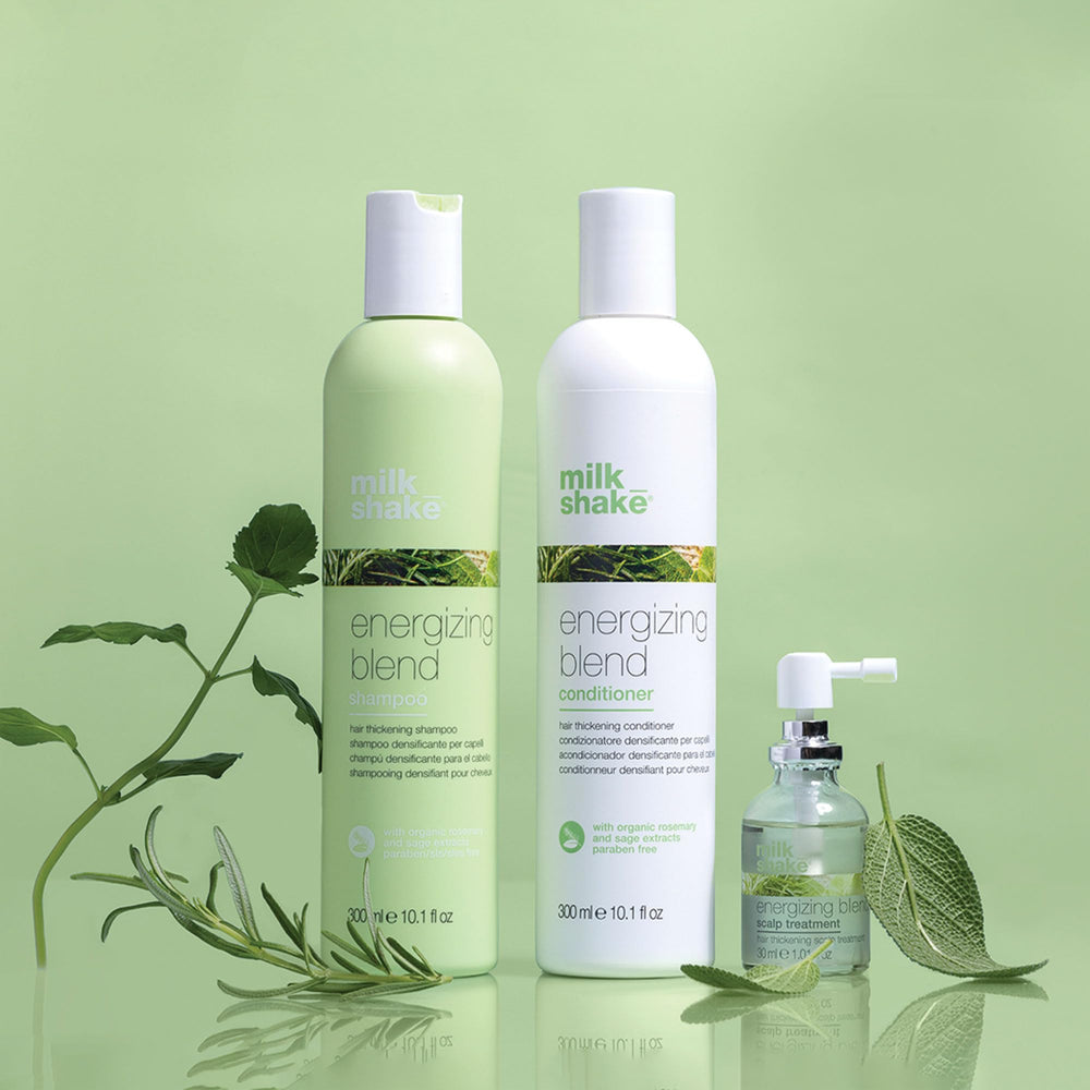 Milk_Shake Energizing Blend Shampoo on store display highlighting salon-grade quality.