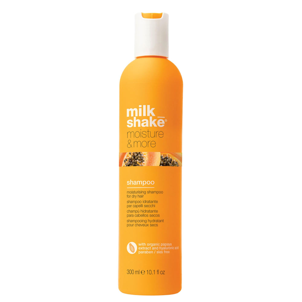 Milk_shake Moisture & More Shampoo bottle pouring for hydration and shine.