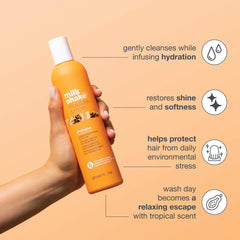 Milk_shake Moisture & More drops on hair indicating moisture seal.