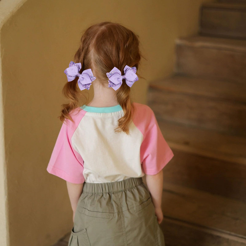 Miroksh boutique-style bow clip complements ponytails, braids, and half-up styles.