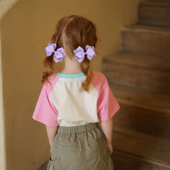 Miroksh boutique-style bow clip complements ponytails, braids, and half-up styles.