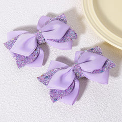 Miroksh glitter purple ribbon hair bow clip with secure alligator clip for lasting hold.