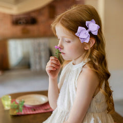 Miroksh purple ribbon hair bow clip ideal for weddings, parties, and everyday wear.