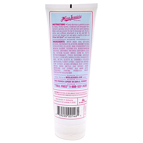 Hands applying Pillow Soft Curls cream for even distribution.