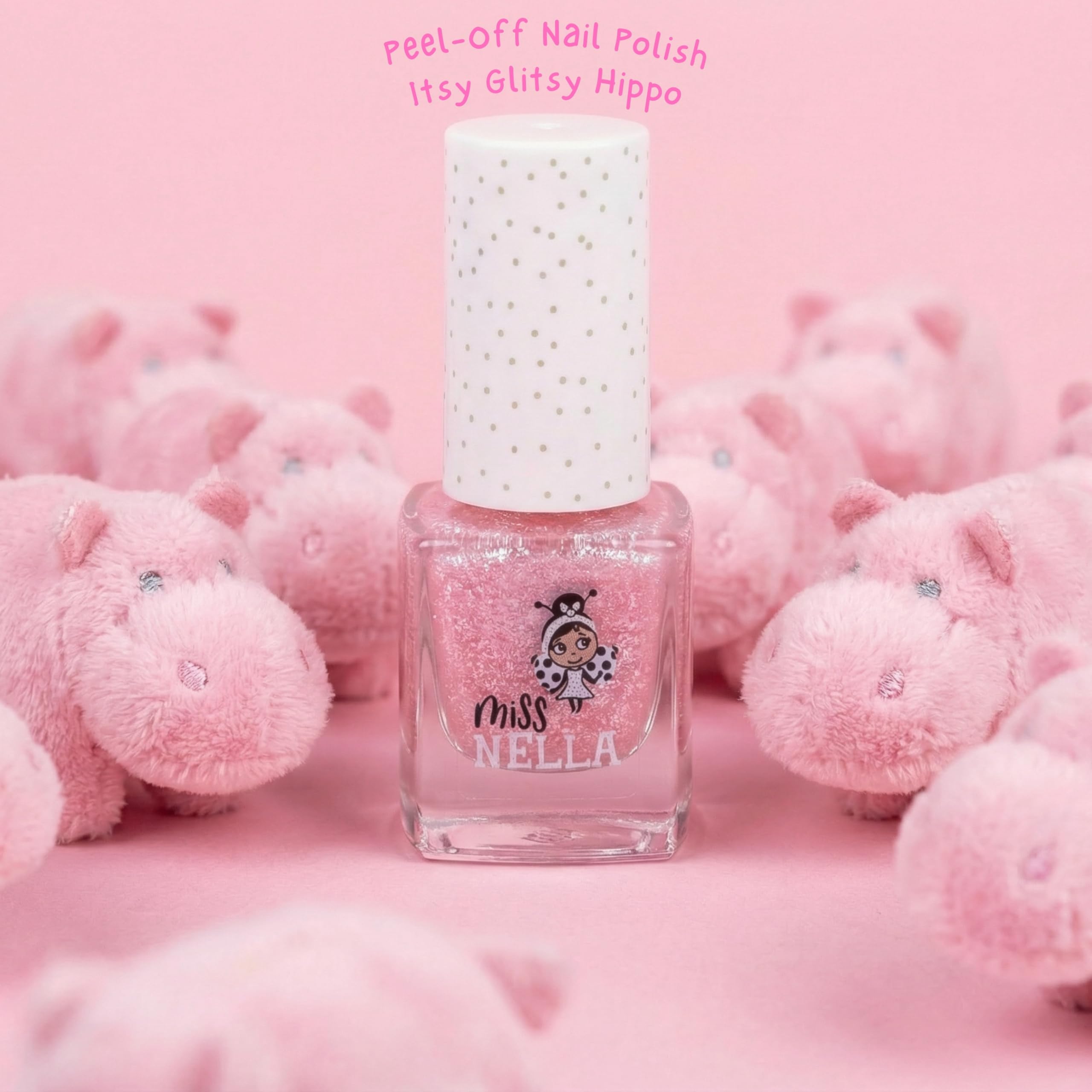 MISS NELLA Itsy Glitsy Hippo being applied on a child's nail with sparkle