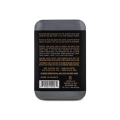 Mistral Black Amber bar soap lather closeup reveals rich foam and enduring fragrance