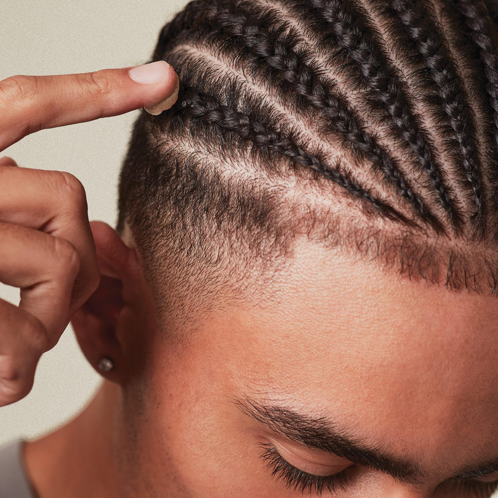 MITCH High Hold Pomade being dispensed for quick application on damp hair.