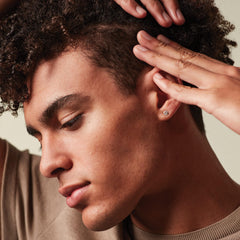 MITCH pomade on hands demonstrates versatile styling options