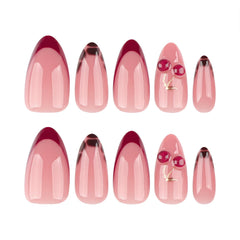 Mivota almond nails show red French tips for a bold chic look