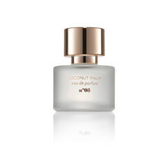 MIX:BAR Coconut Palm spray action, suggesting a luxe, long-lasting fragrance experience.