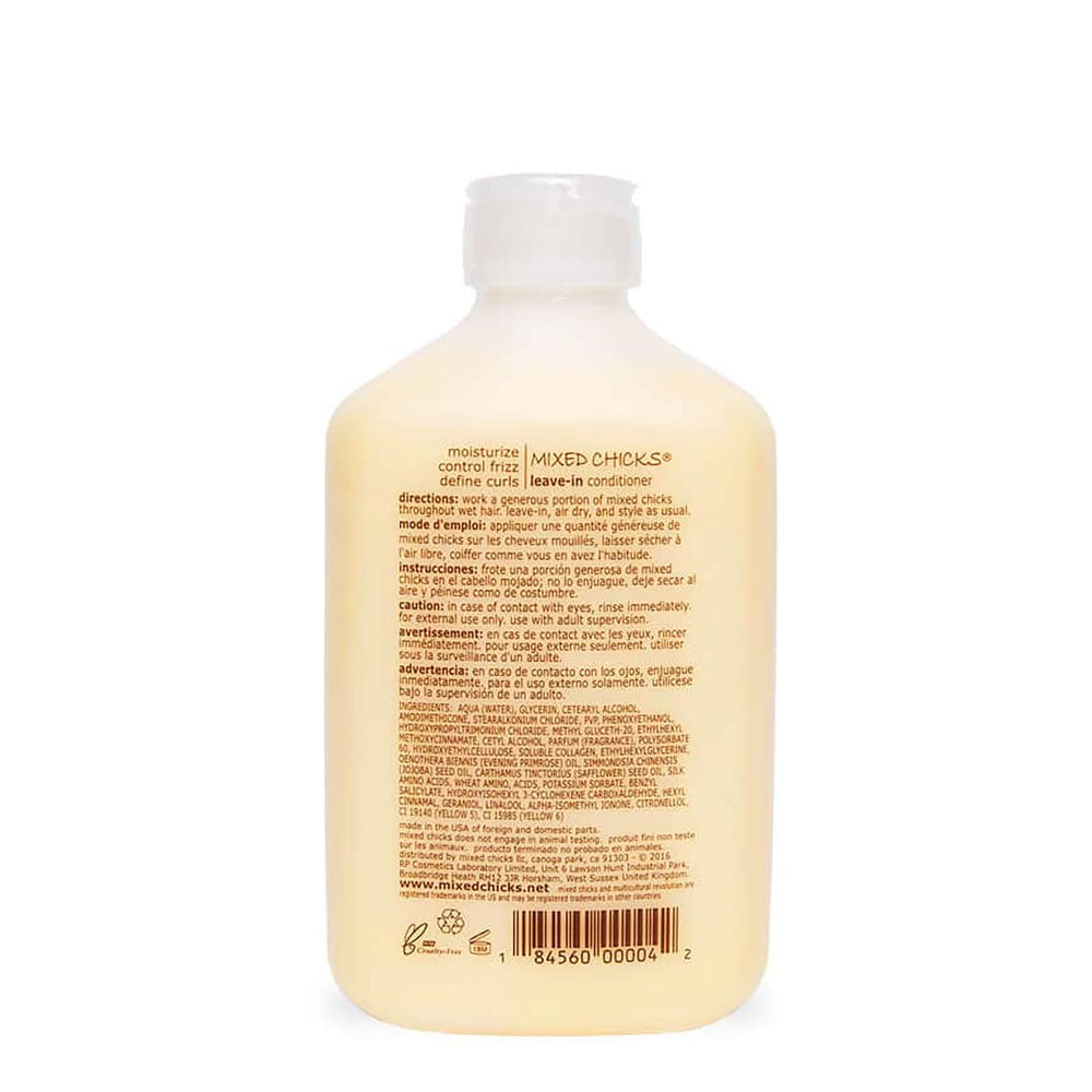 Mixed Chicks leave-in cream application highlights frizz control and lightweight slip.
