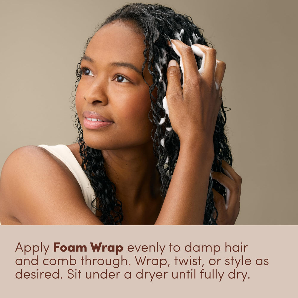 Mizani Foam Wrap bottle pouring frizz control during styling