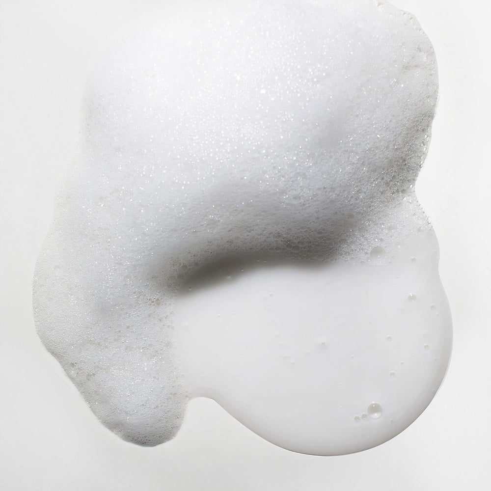 Mizani Moisture Fusion Shampoo curls on towel-dried hair look soft and defined.