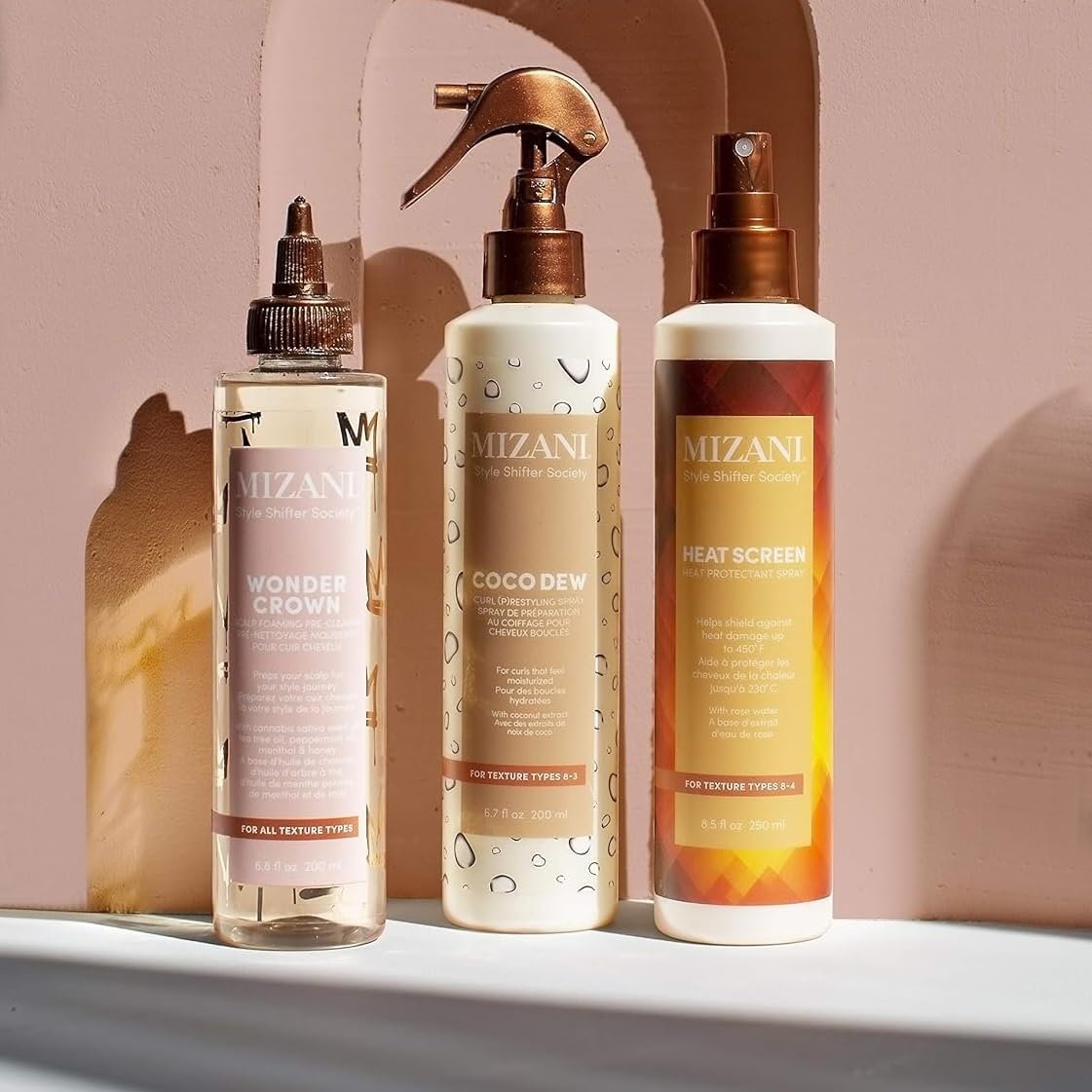 Mizani Style Shifter Society Coco Dew Curl Restyling Spray on second-day curls for smooth refresh