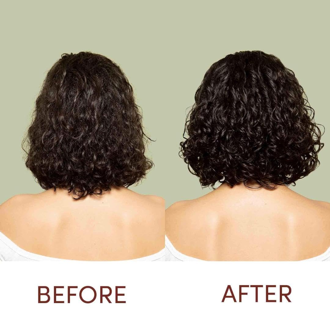 Mizani conditioner pump highlights nourishing formula for frizz control.