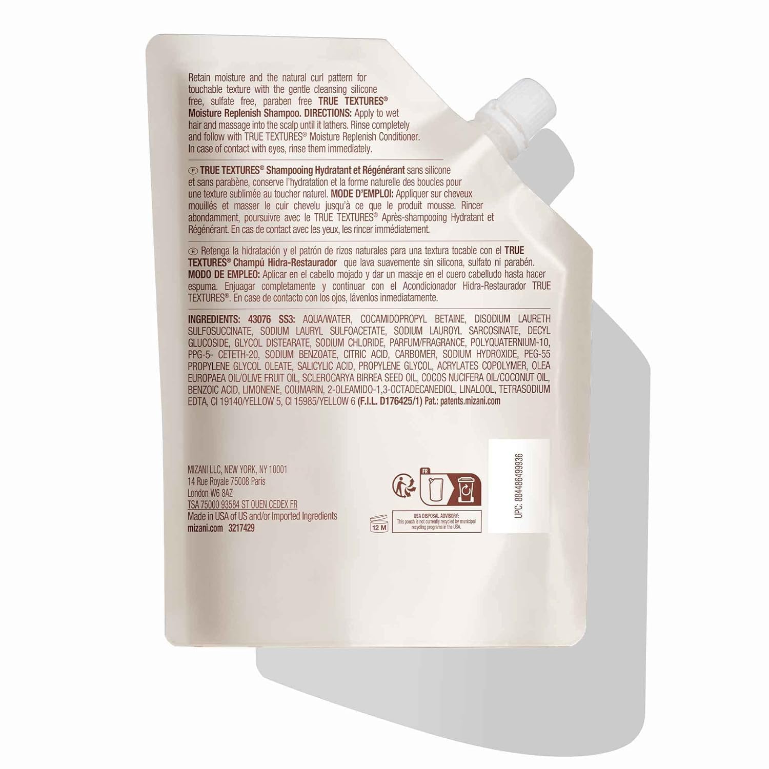 Mizani bottle on sink demonstrates easy wash-day routine for curls