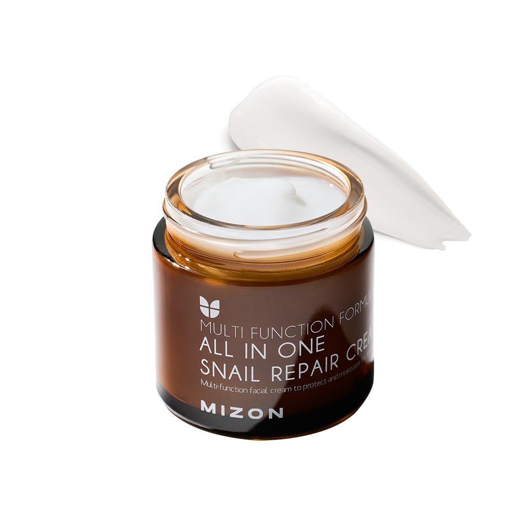 Crema MIZON reparadora con caracol, envase visible para cuidado diario.