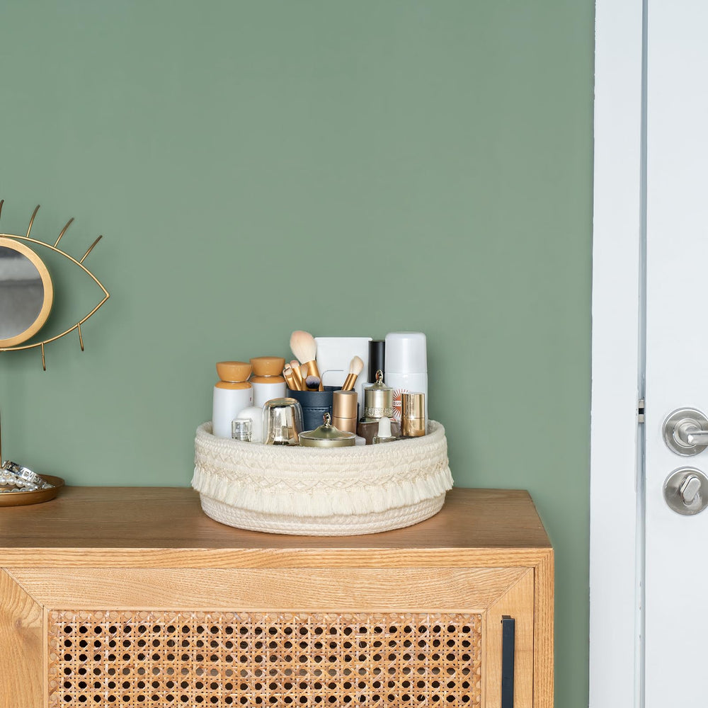 Mkono cosmetics-storage-basket keeps brushes and bottles neatly arranged.