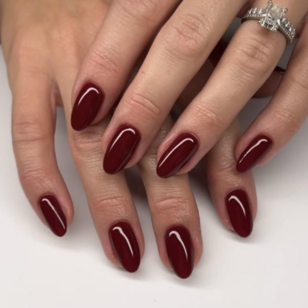 Modelones 32-piece nails in 16 sizes shown for precise finger fit.
