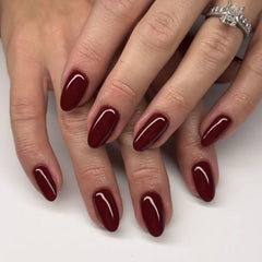 Modelones 32-piece nails in 16 sizes shown for precise finger fit.