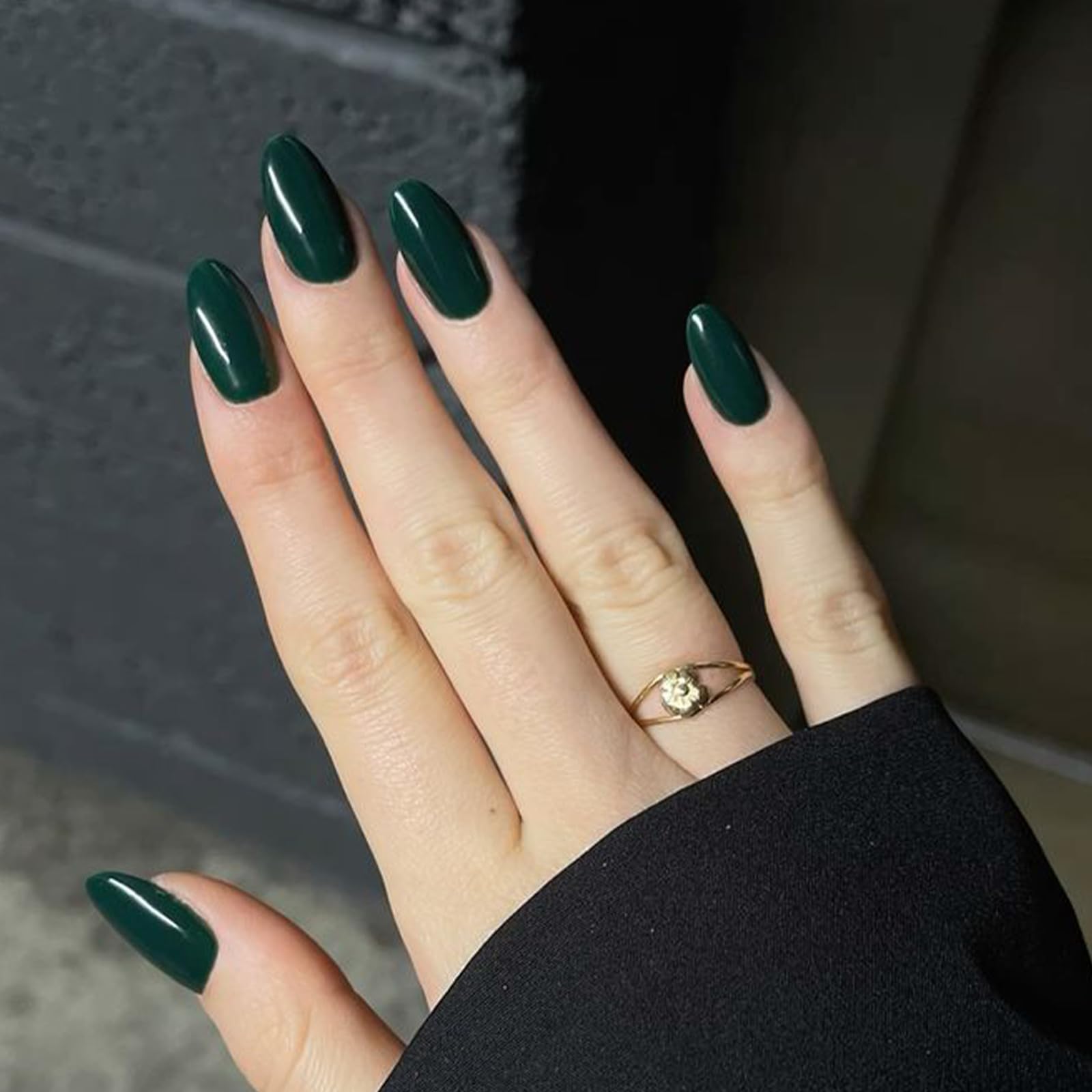 Modelones dark green almond nails with 16 sizes for perfect fit.
