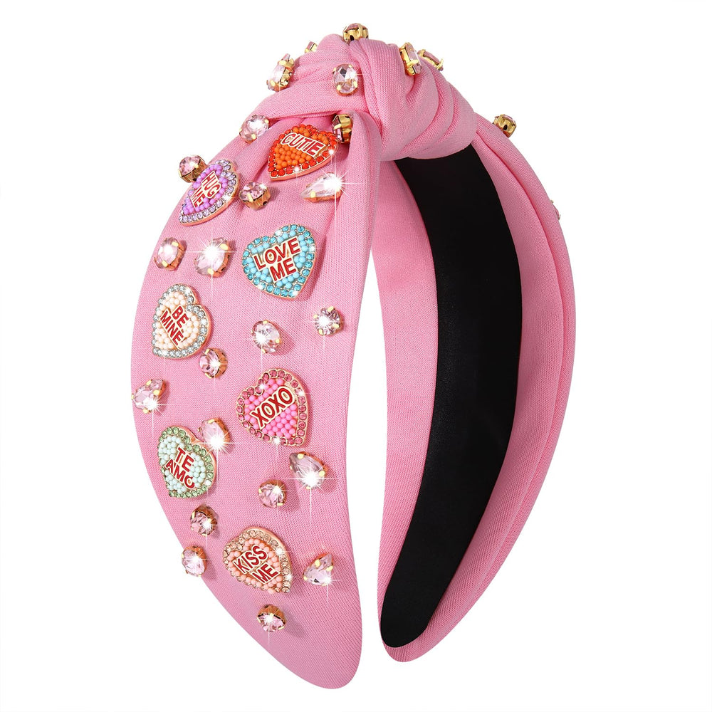 MOLOCH pink heart headband with rhinestones for sparkling evening looks.