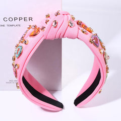 MOLOCH pink heart headband in crushed velvet for comfortable all-day wear.